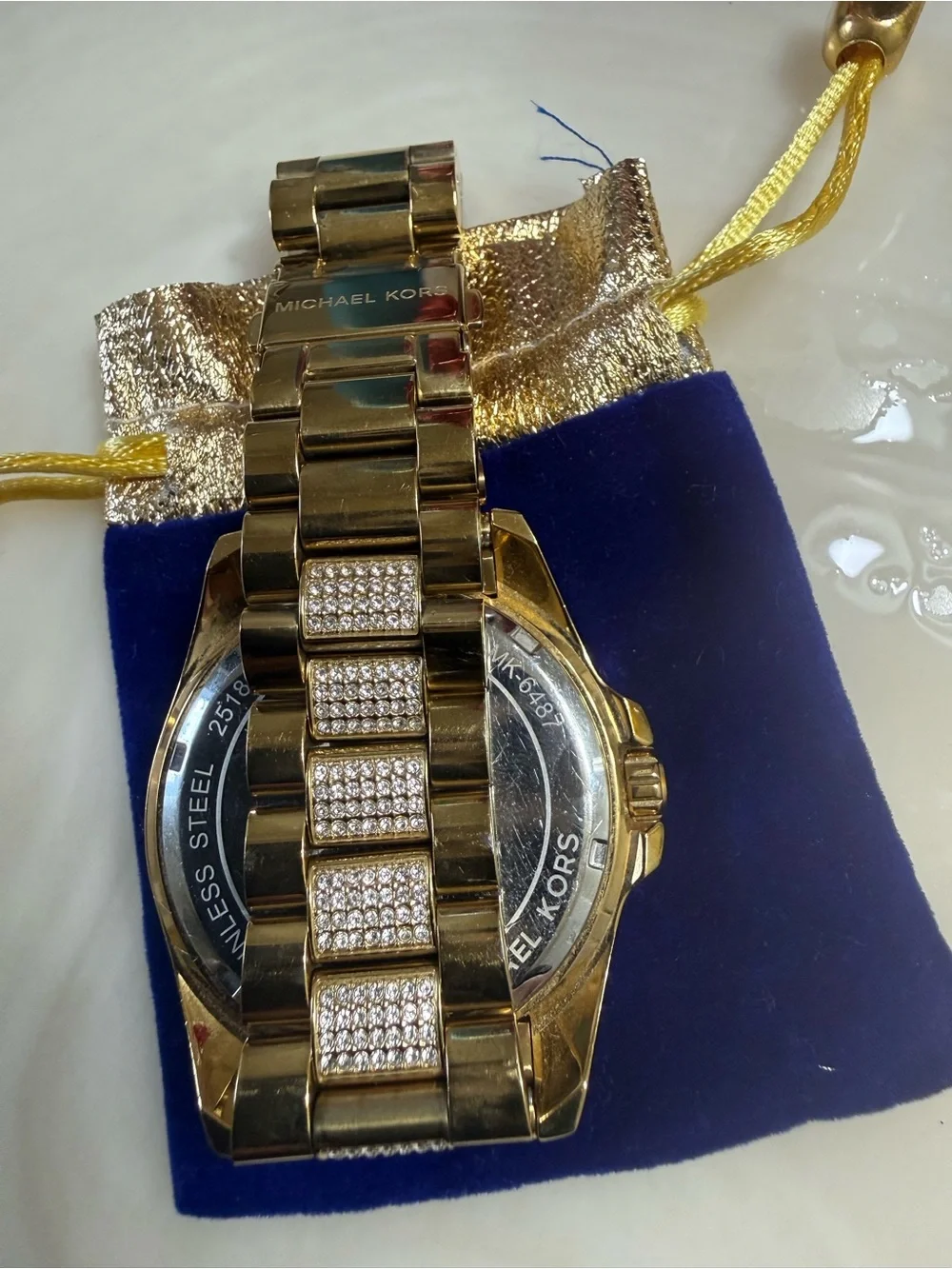 Michael Kors Gold and Crystal Pavé Logo Bracelet Watch